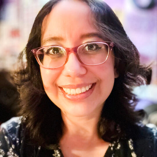 Headshot of Jacqueline Maya.